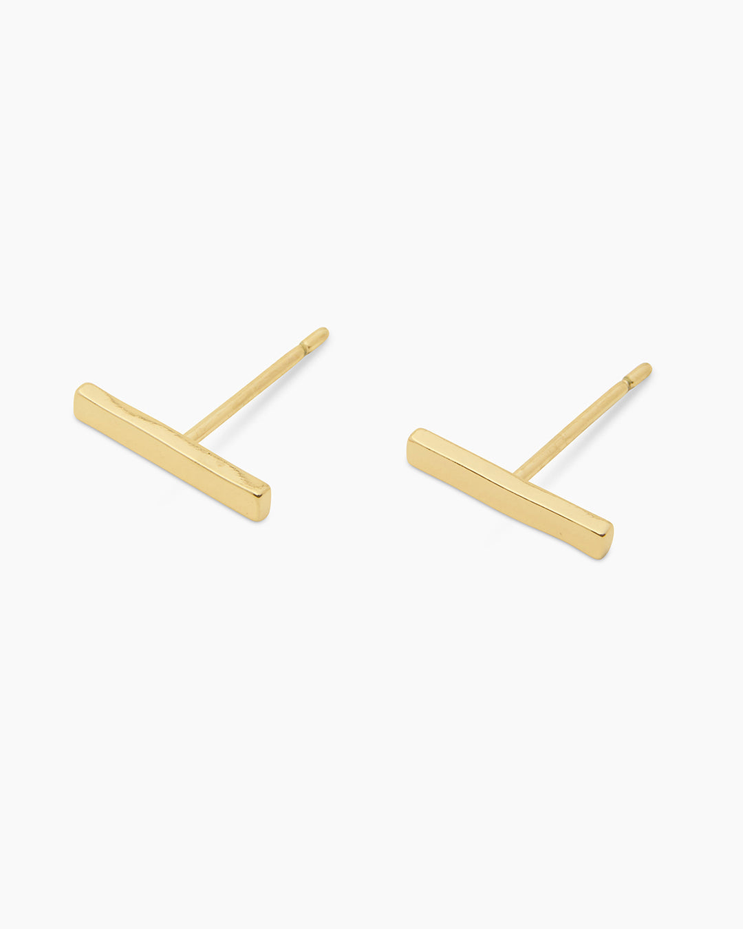 Gorjana tanner bar mini studs in gold on a white background