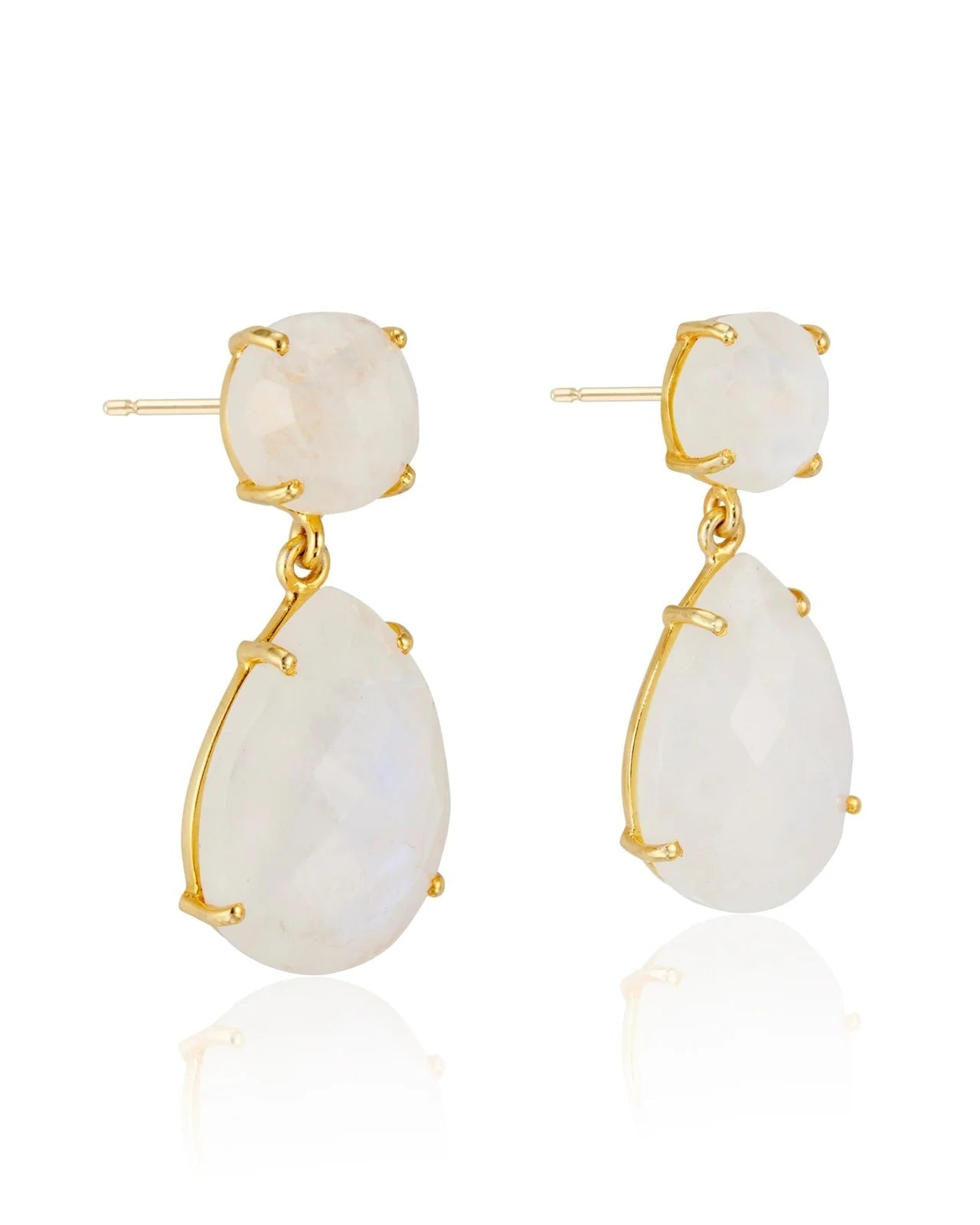 A pair of double drop earrings with white gemstones, set in 14K gold vermeil on a white background