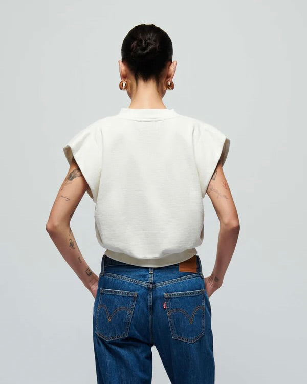 Back view of the Nation Lenon crewneck sweatshirt and jeans standing in front of a white background.