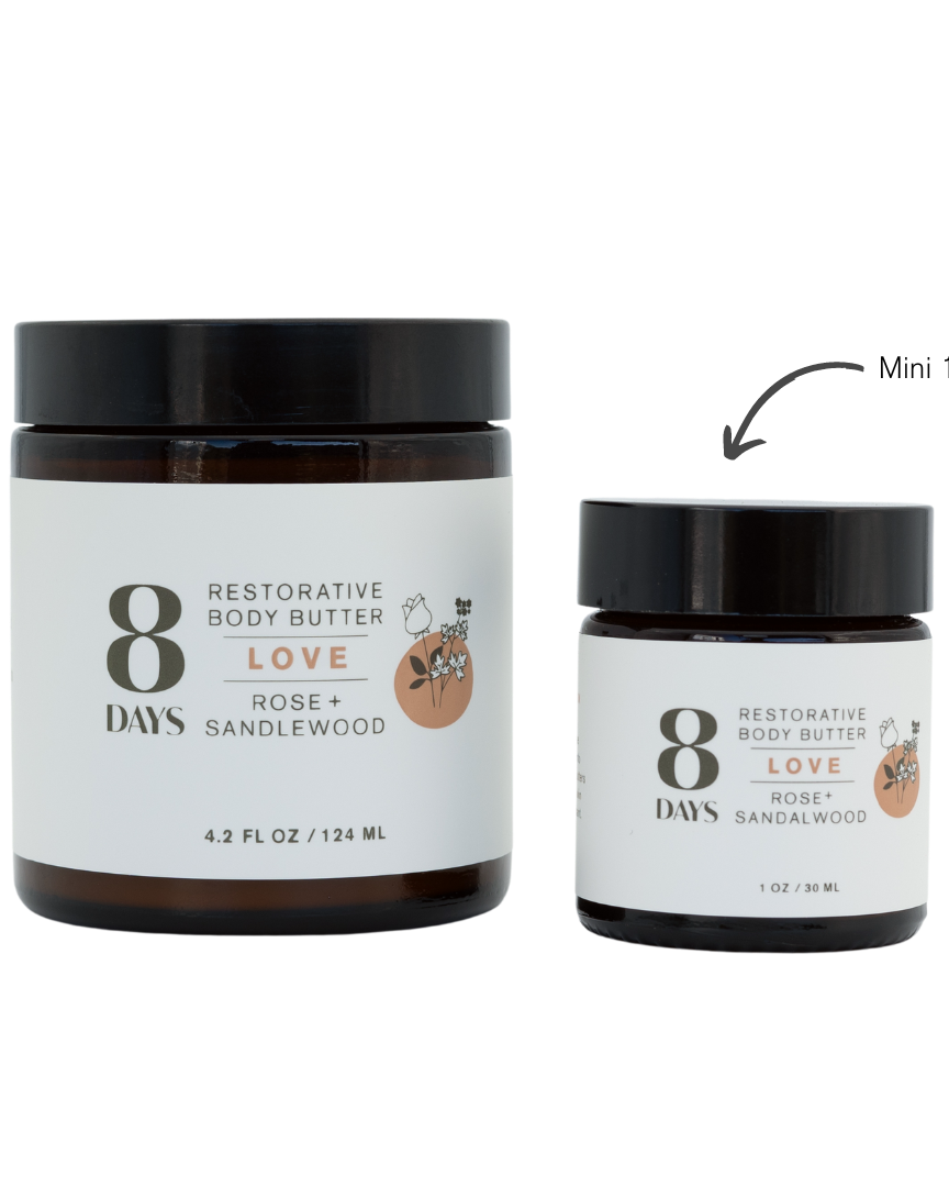 Two jars of '8 Days' restorative body butter, one large and one mini, on a white background.