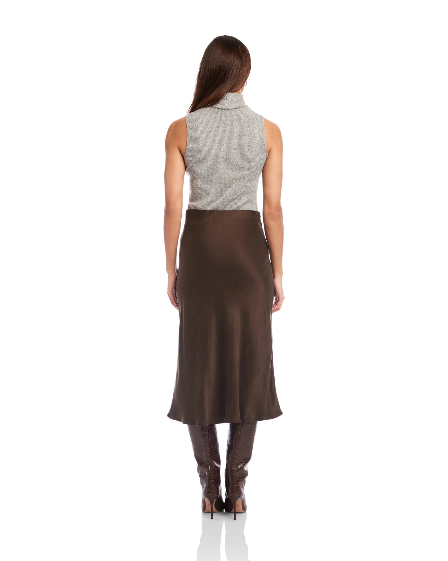 Model is wearing Fifteen Twenty Brielle Midi Skirt in color Brown on a white background.