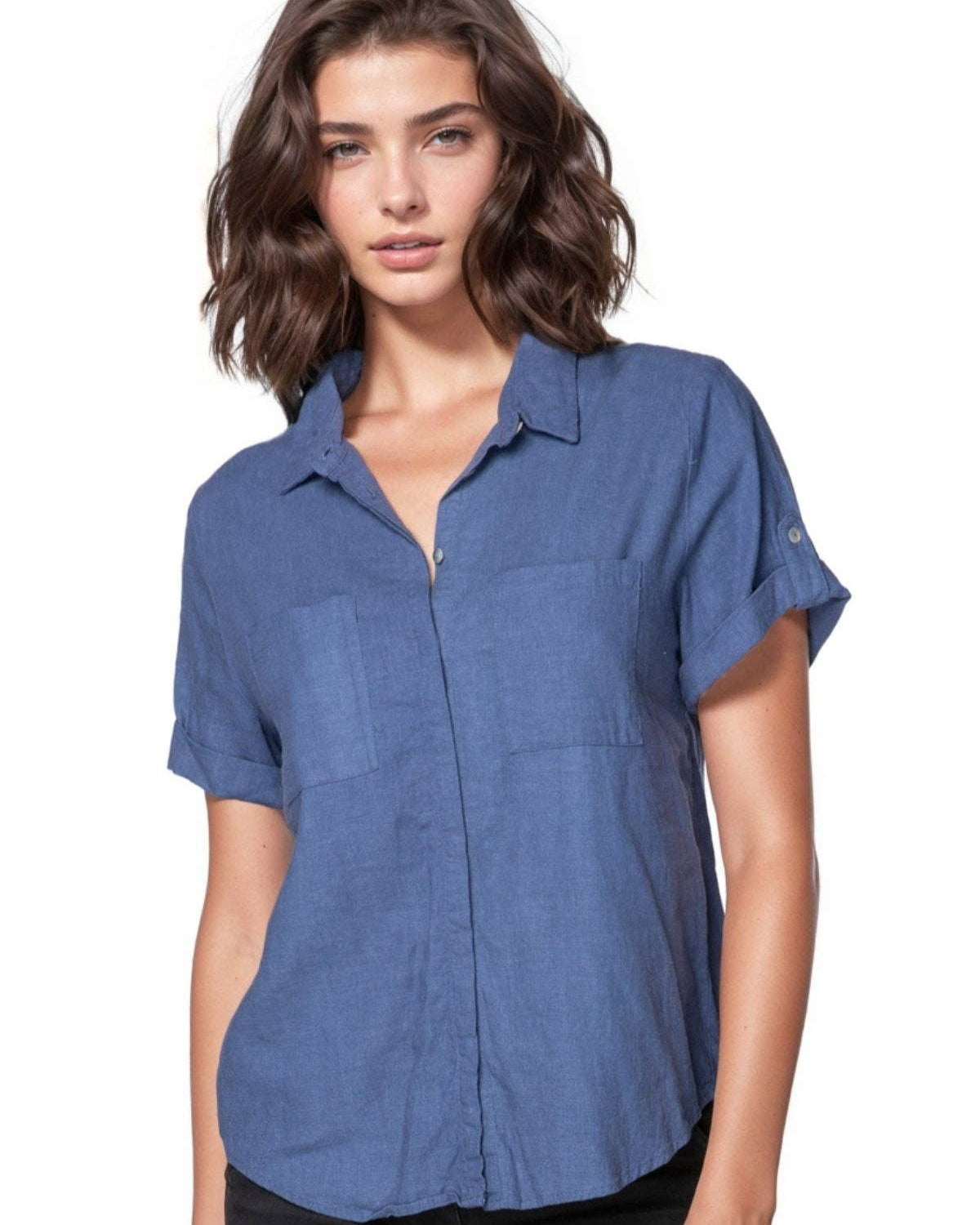 Woman wearing a blue short-sleeve shirt on a white background