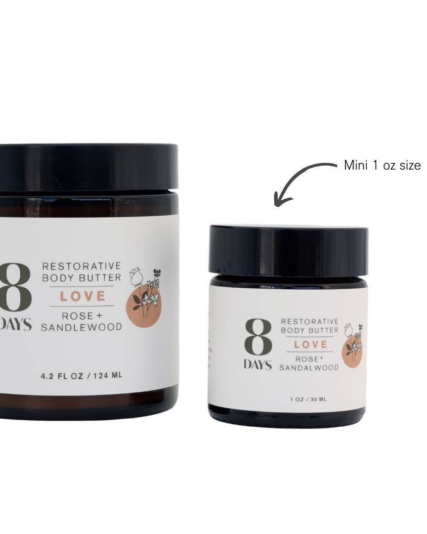 Two jars of '8 Days' restorative body butter, one large and one mini, on a white background.