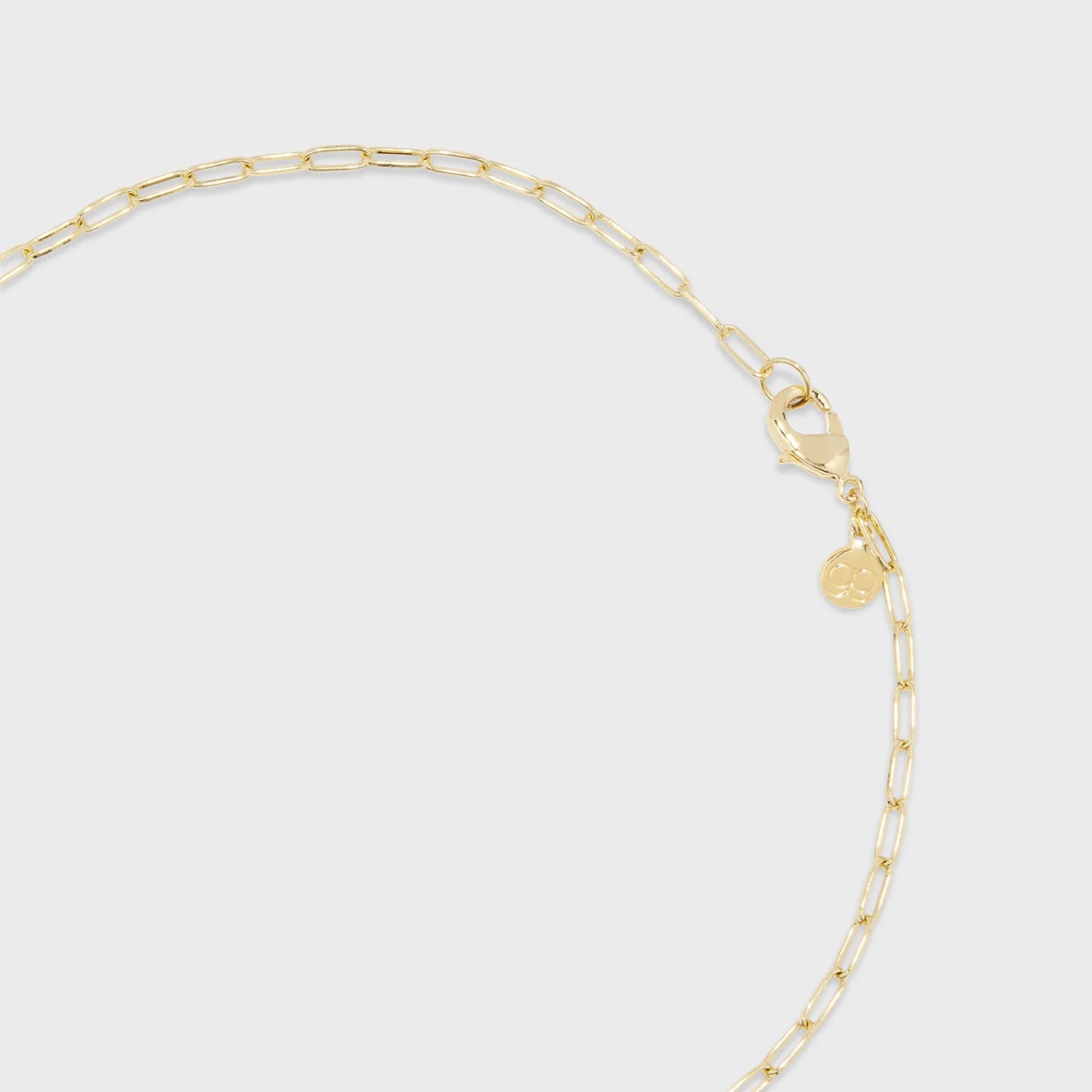 Detailed photo of the clasp on the Gorjana Reese Pearl Necklace on white background