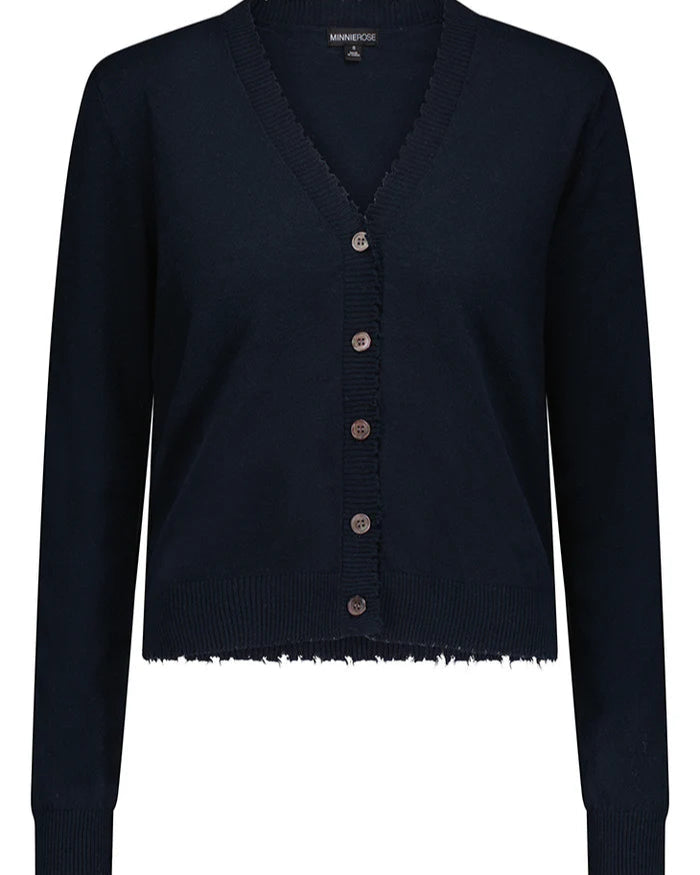 Navy blue cardigan with buttons on a white background