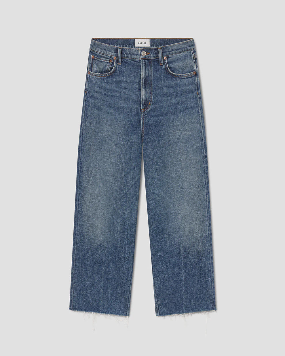 Blue jeans on a light gray background