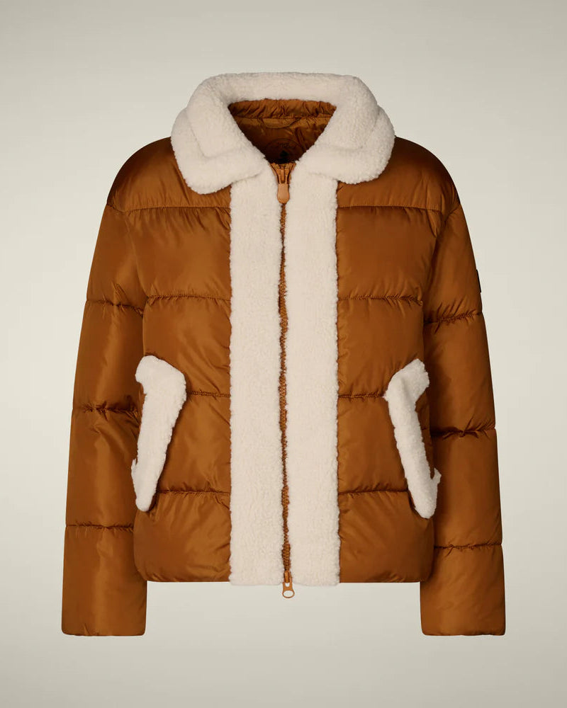 Brown puffer jacket with white fur trim on a beige background
