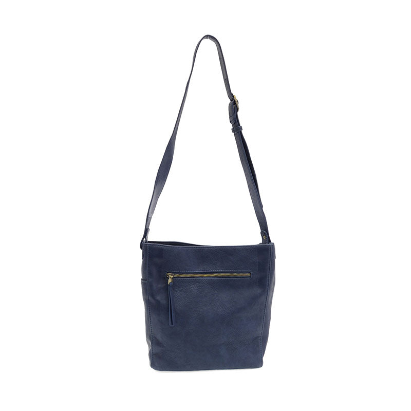 Navy vegan leather bucket handbag with gold accents against a white background.