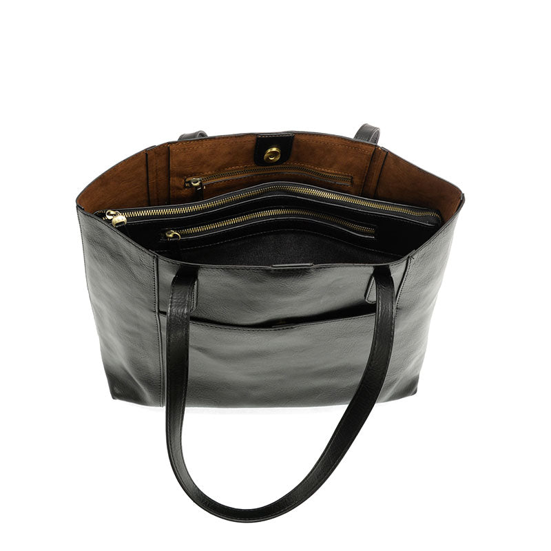 Black vegan leather laptop tote against a white background.