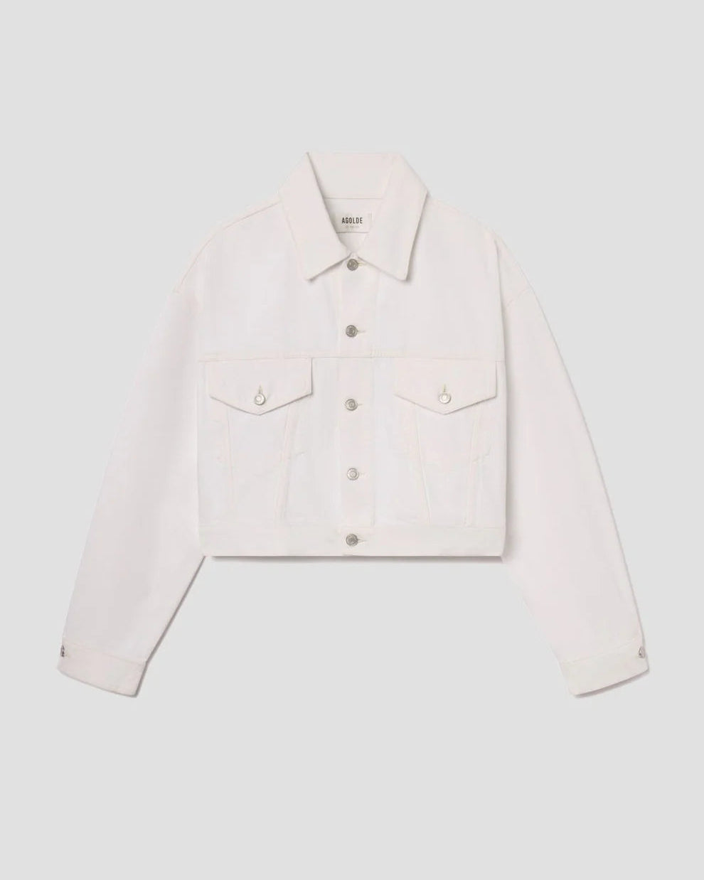 Light-colored denim jacket over a white shirt on a light gray background