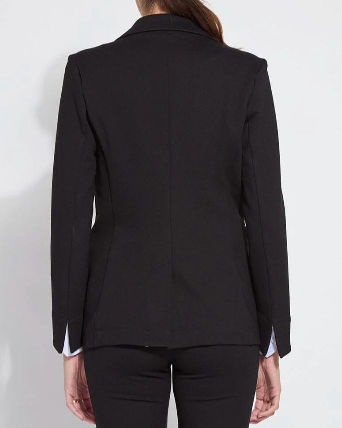 Black blazer worn by a person on a white background