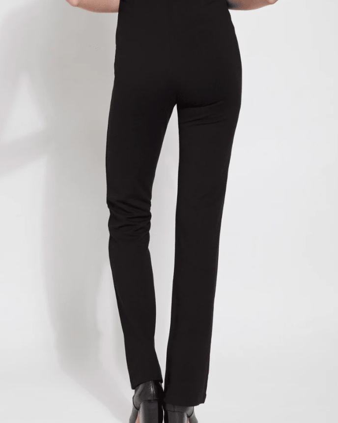 Black pants worn by a person on a white background