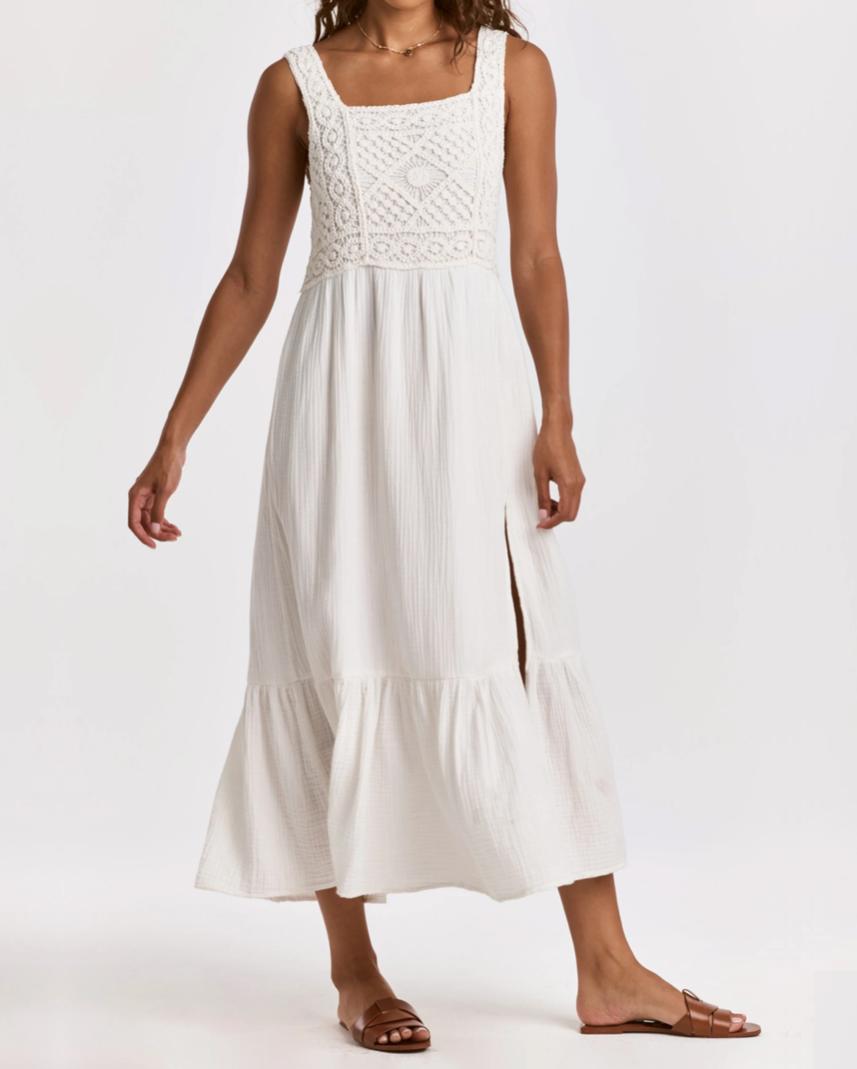 Front view of the Dear John Chasity dress in white on a model posing in front of a white background