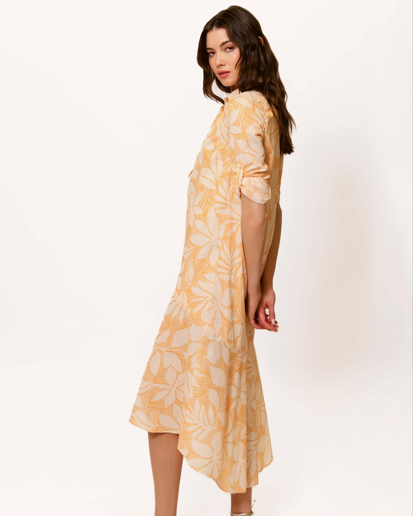 Model is wearing Hutch Jayden Midi Dress in Yellow on a white background.