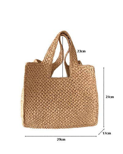 Woven handbag with dimensions indicated on a white background
