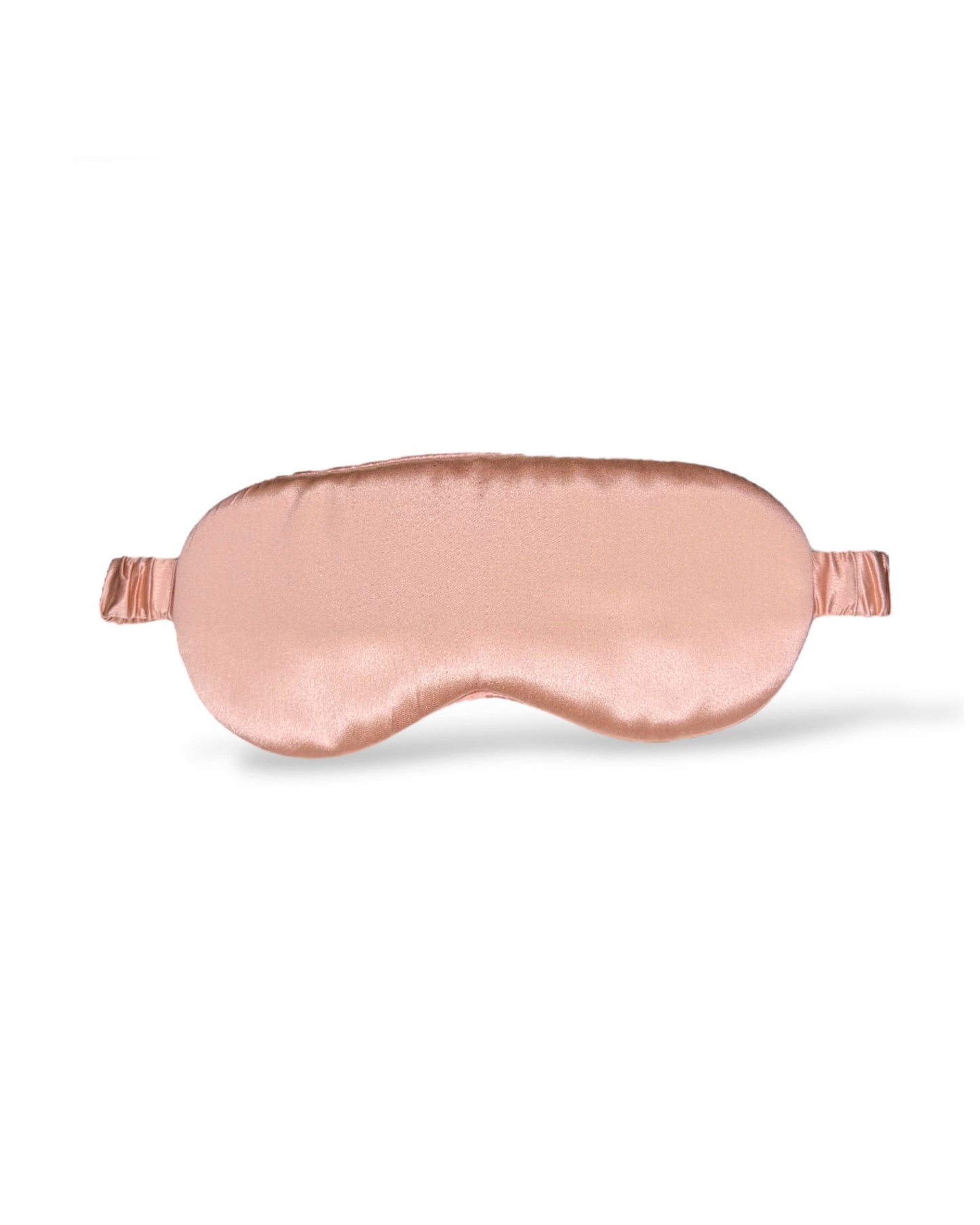 Rose gold HoneyLux silk sleep mask on a white background