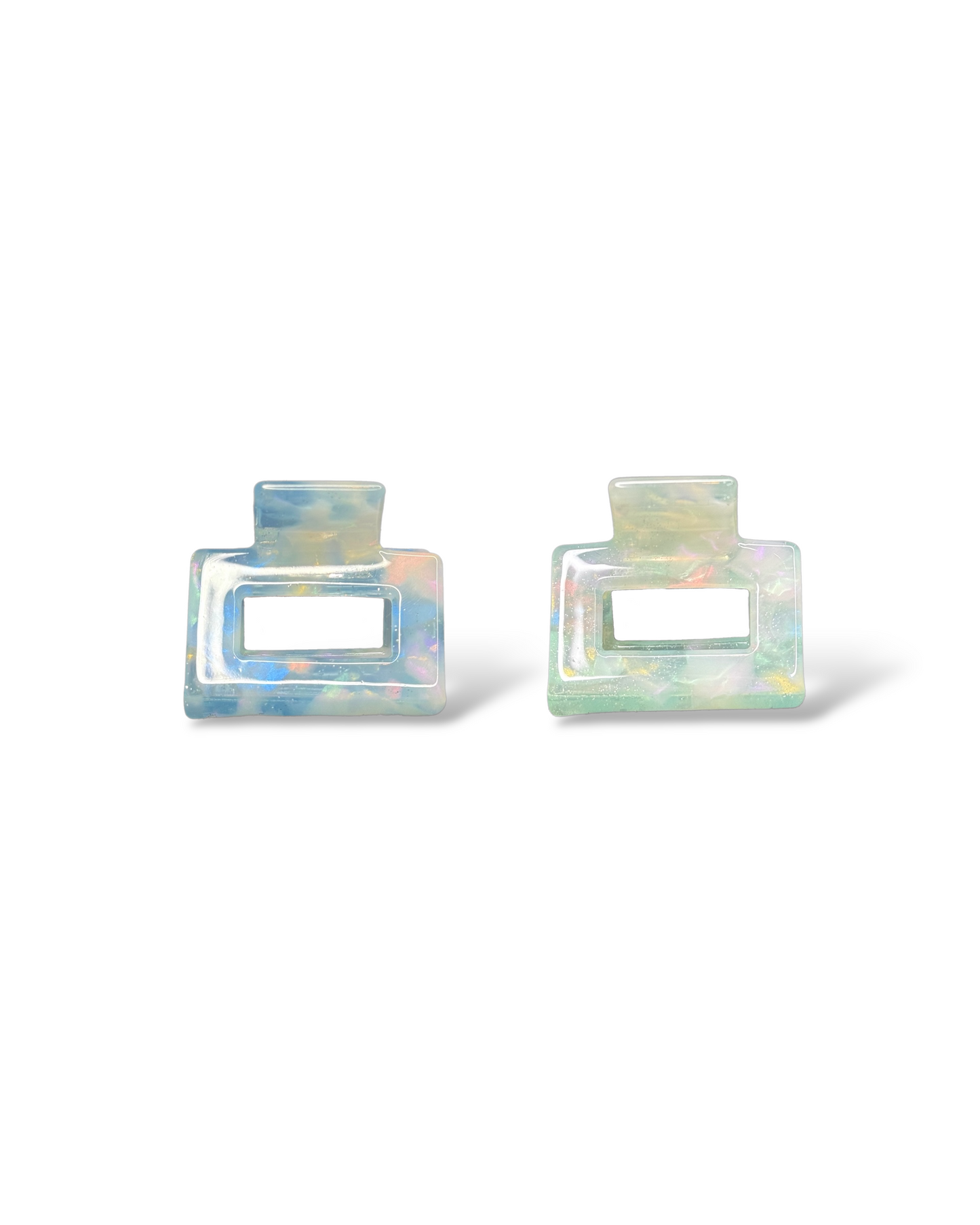 The HoneyLux Acetate Mini Square Claws clips in the color mist on a white background