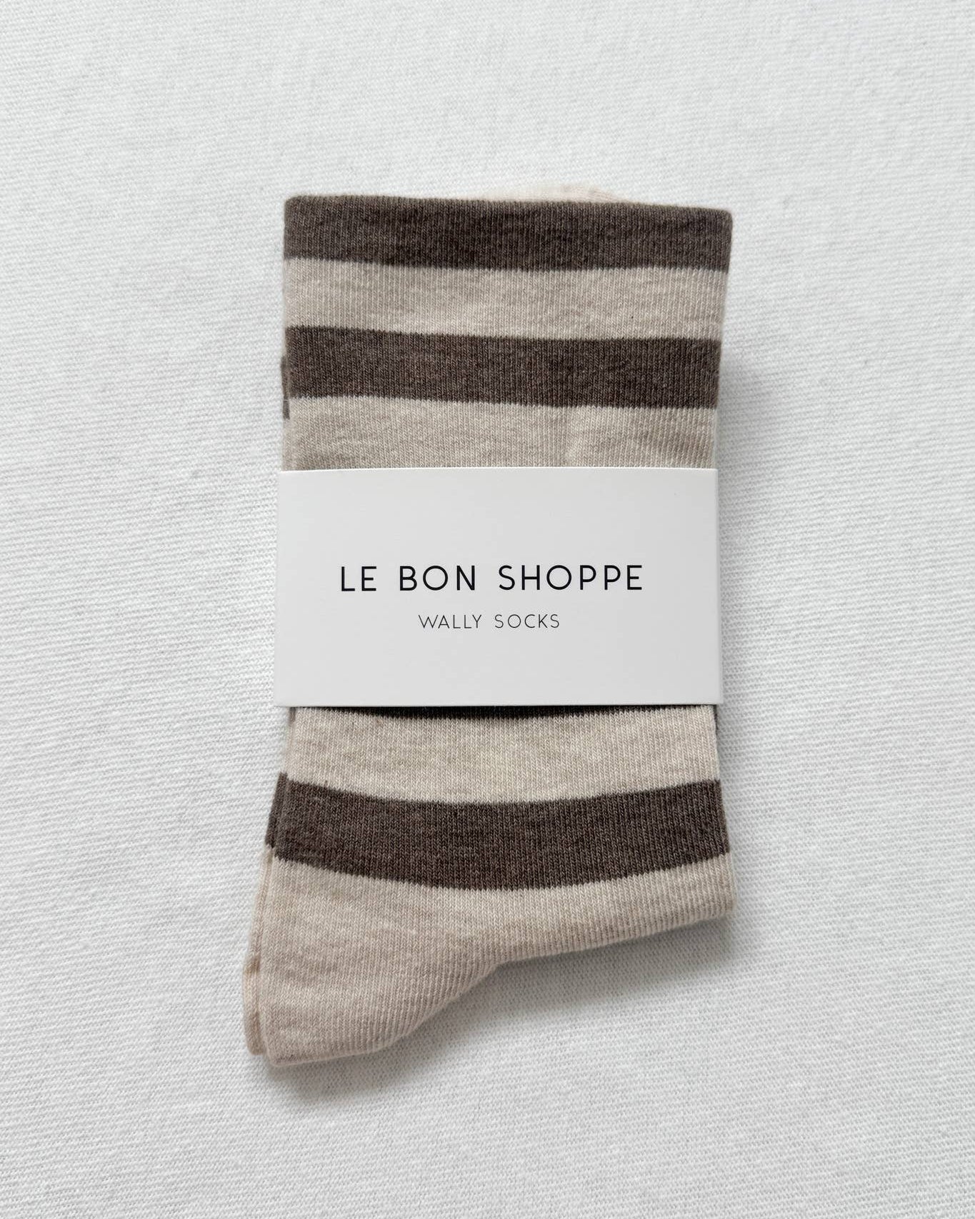 Pack of striped socks with 'Le Bon Shoppe' label on a light gray background