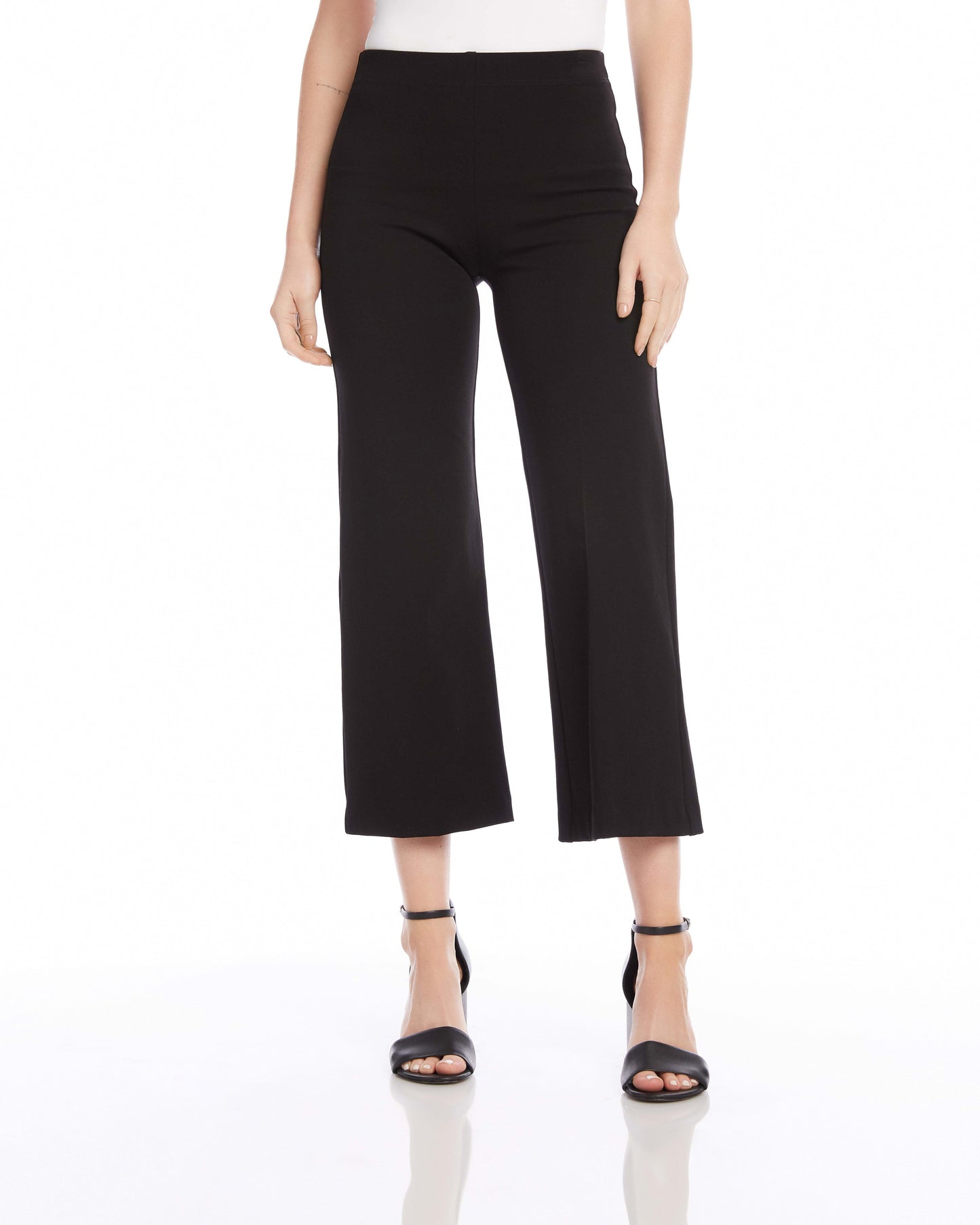 Front view of a model wearing the Fifteen Twenty Wide-Leg Cropped Pants in front of a white background