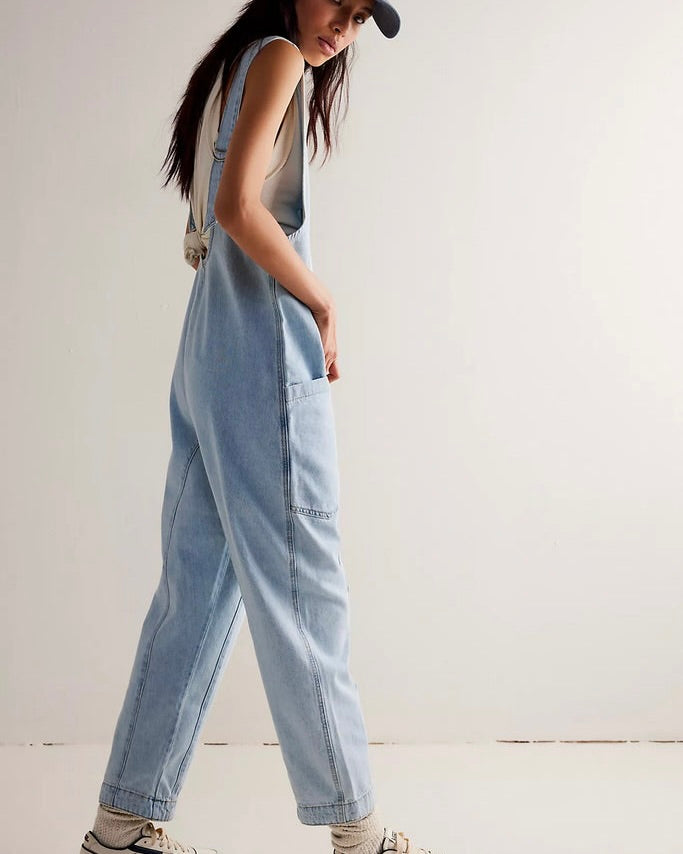 Model wearing Free People High Roller Jumpsuit on a white background