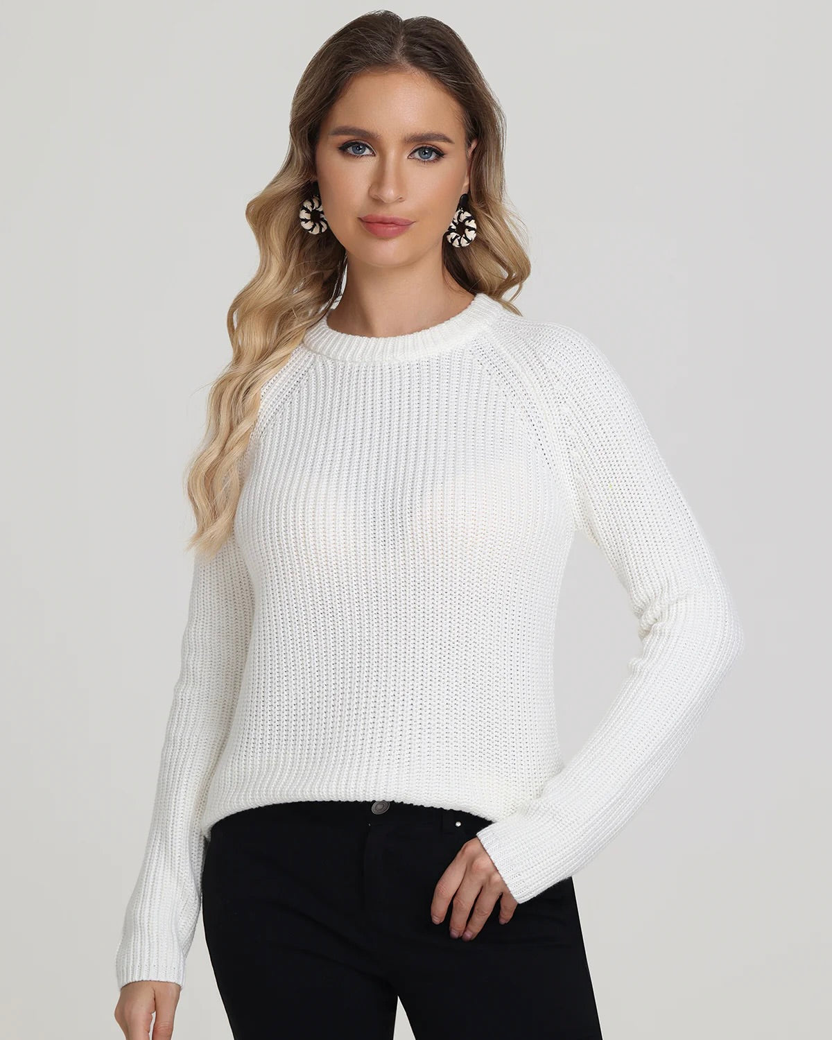 Model wearing 525 America Jane Pullover Sweater in white wearing black jeans on a white background