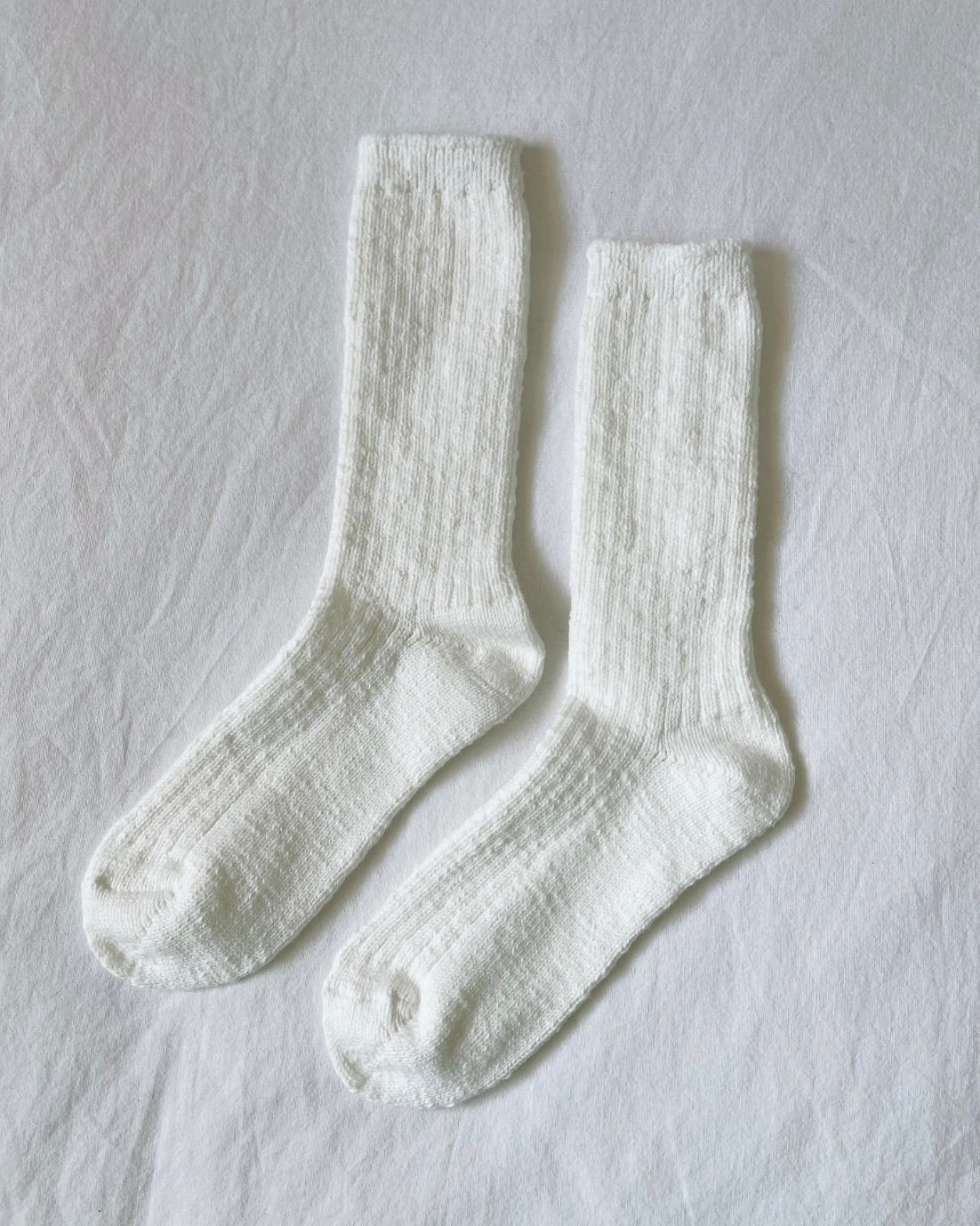 Le Bon Shoppe cottage socks in white linen on a white background