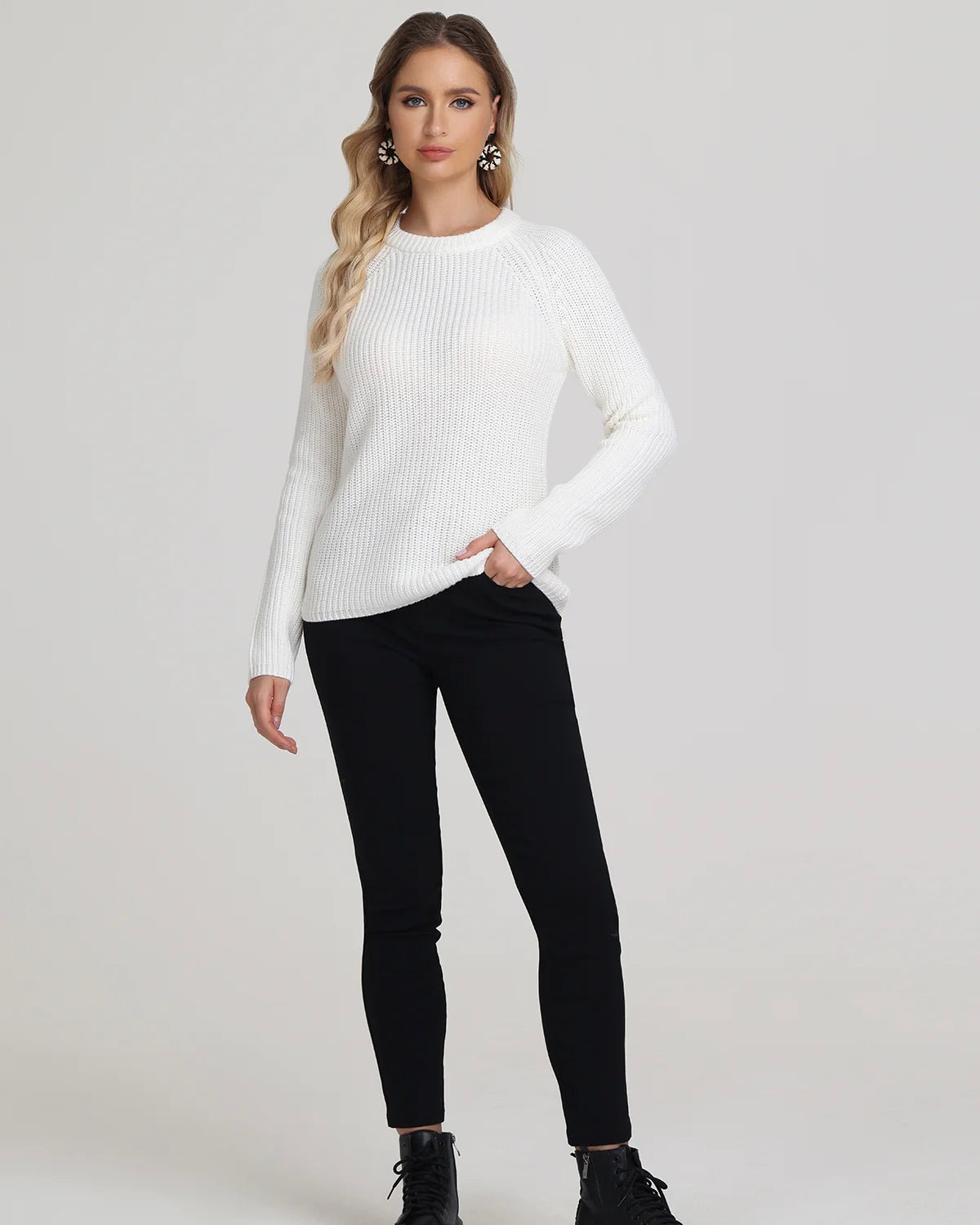 Model wearing 525 America Jane Pullover Sweater in white wearing black jeans on a white background