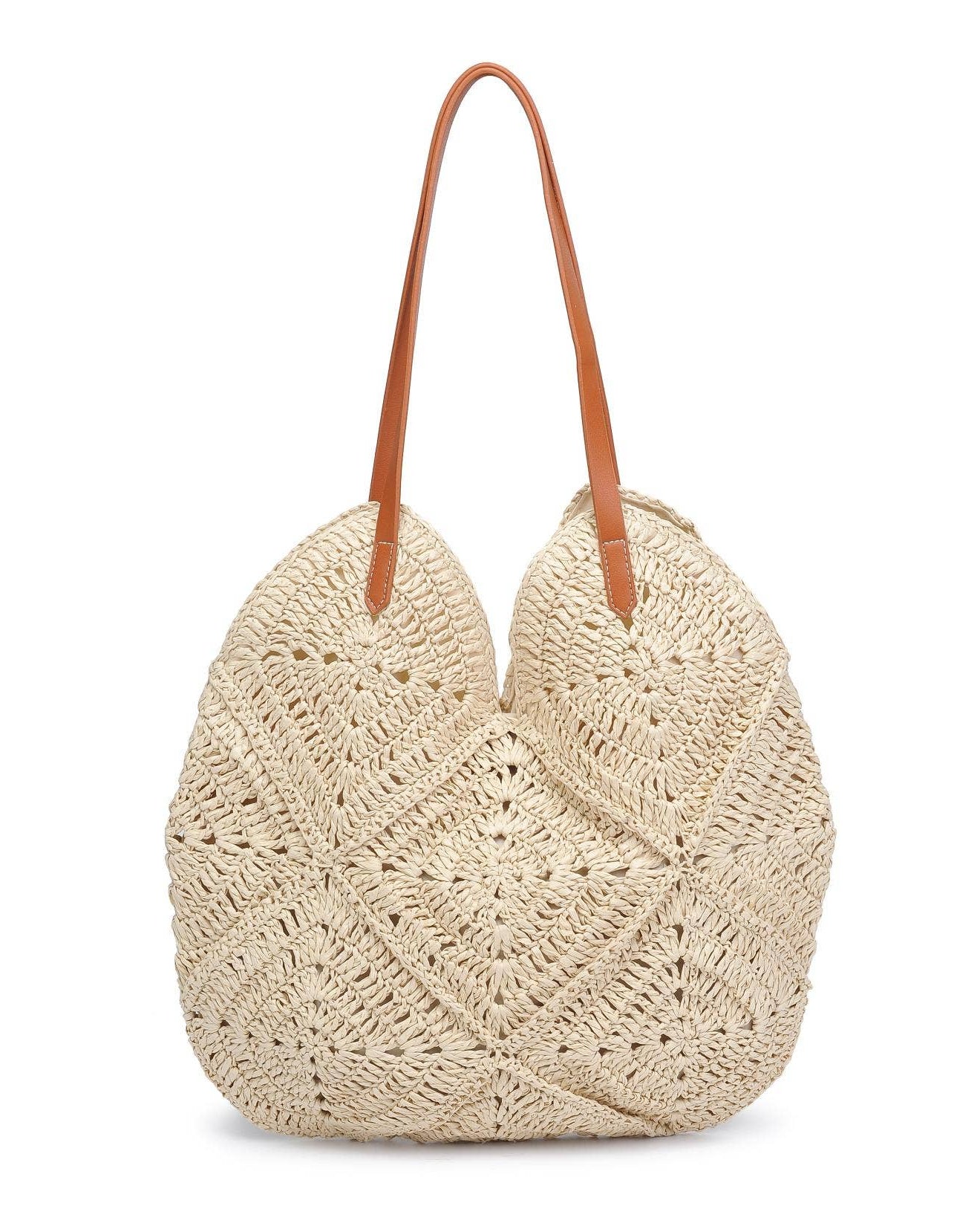 Beige woven handbag with brown handle on a white background