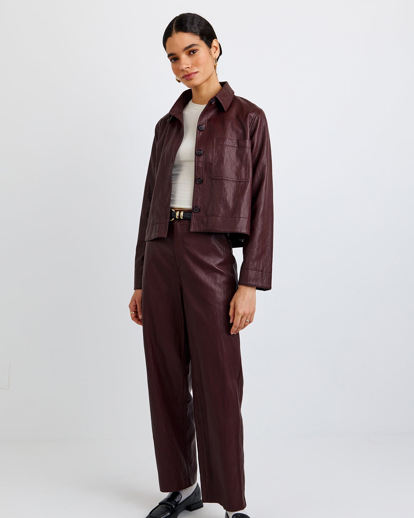 Model wearing Bella Dahl CROP POCKET BUTTON DOWN with matching pants standing in front of a white background