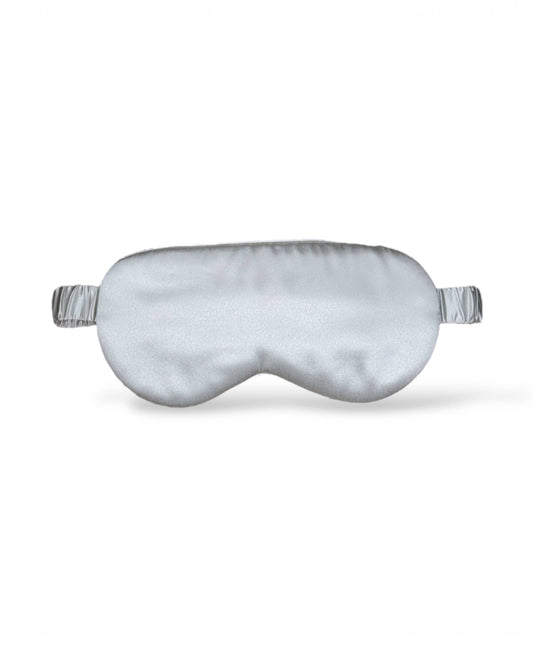 Silky gray sleep mask on a white background
