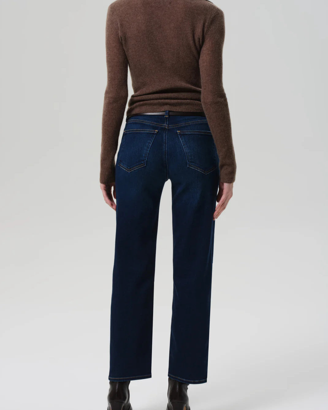 Back view of a model wearing the Citizens of Humanity Palma Straight Leg Jeans in Dakota on a white background.