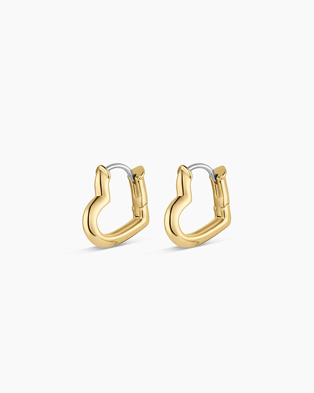 Gold hoop earrings on a white background