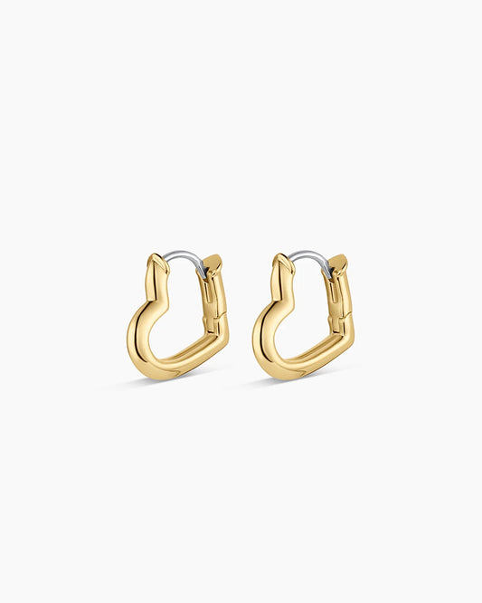 Gold hoop earrings on a white background