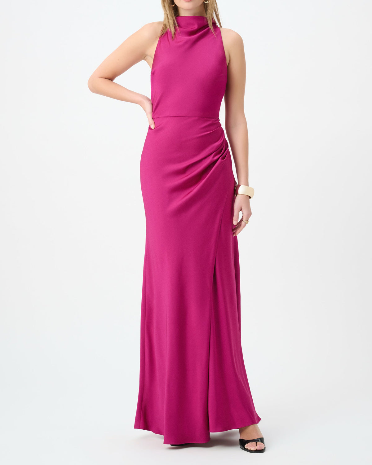 Woman wearing a pink evening gown on a white background