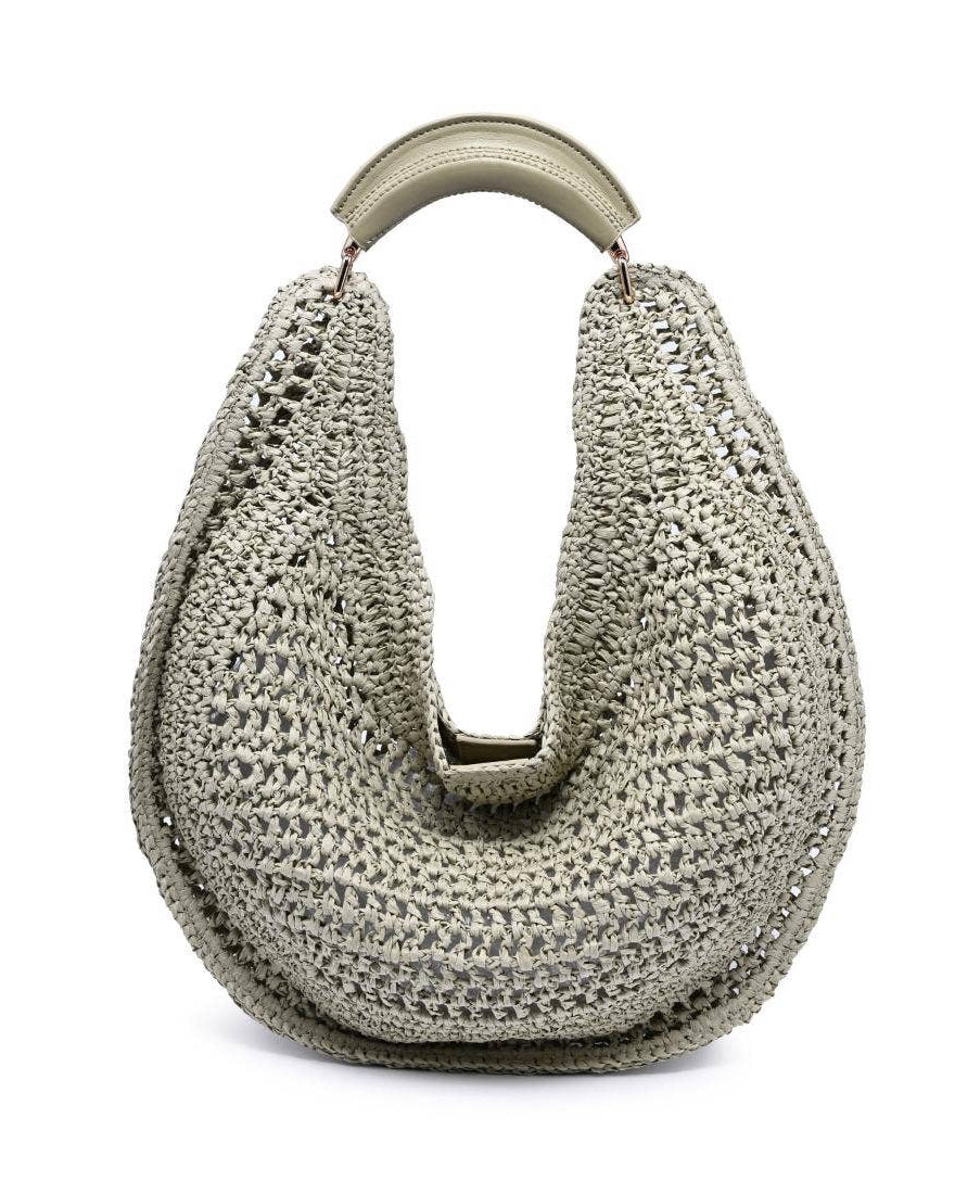 Crocheted handbag with a handle on a white background