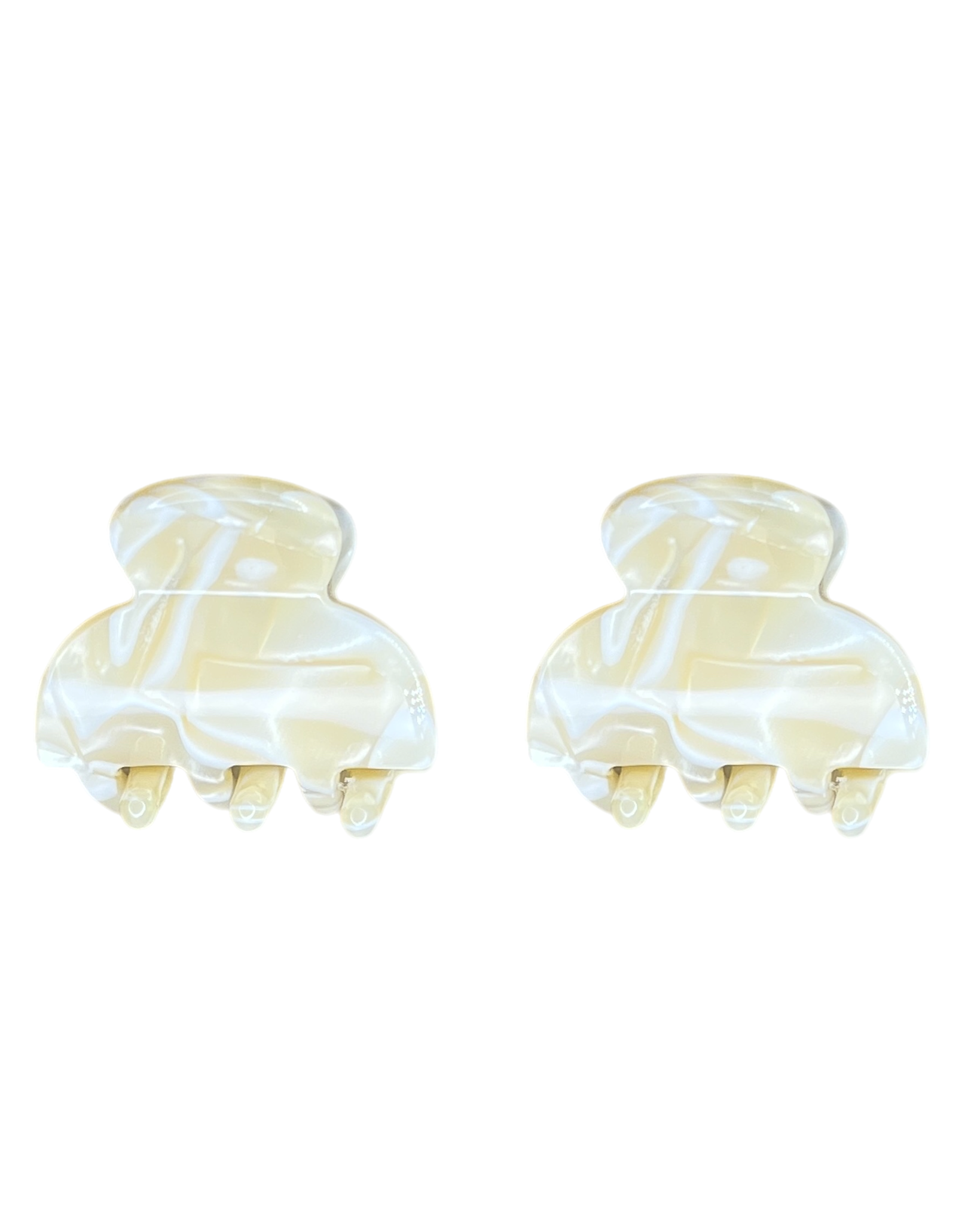 Two marbled hair clamps on a white background