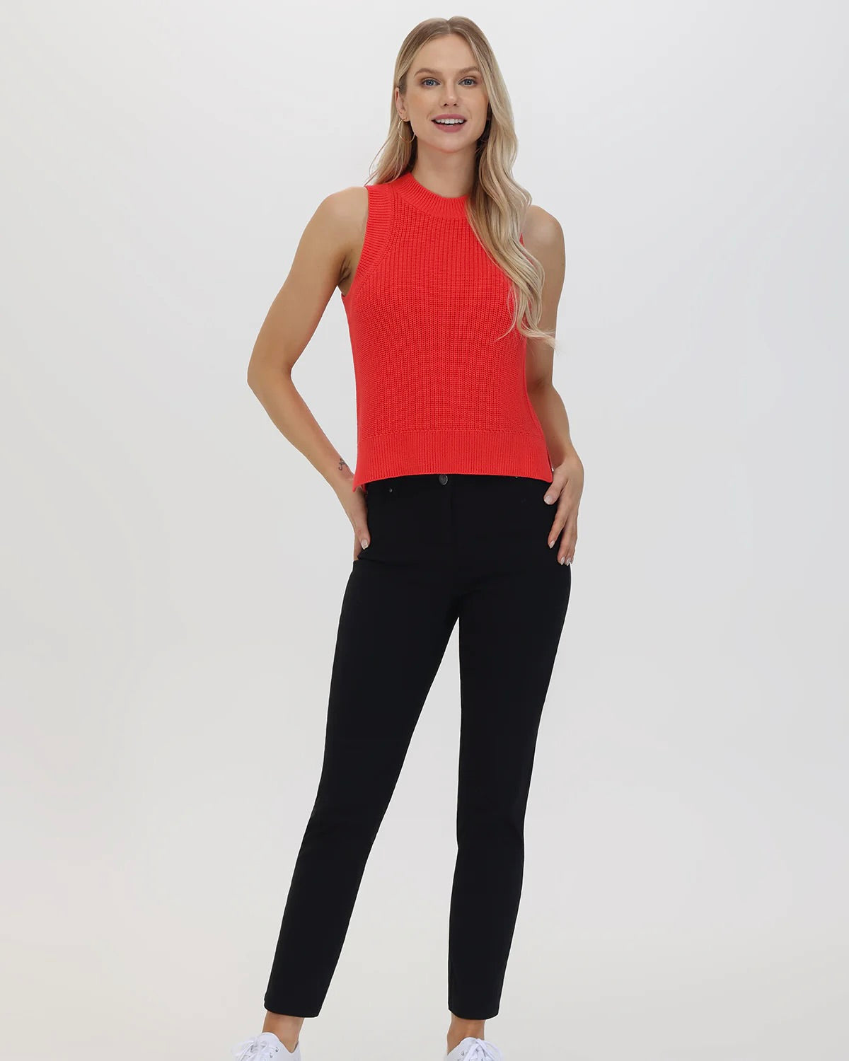 Model wearing 525 Hibiscus Demi Tank wearing black jeans on a white background