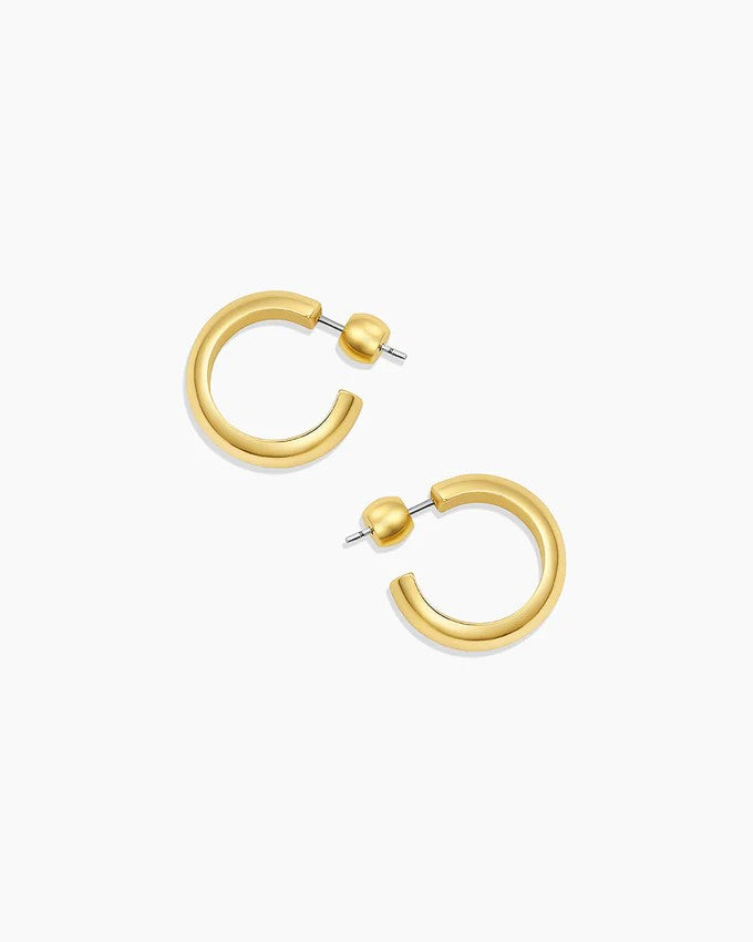 Image of Gorjana Paseo small gold hoops on a white background