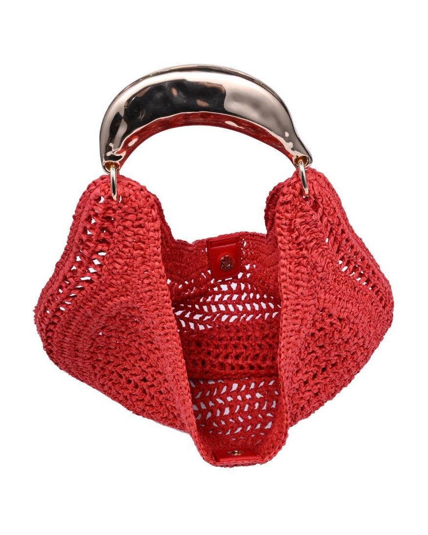 Red woven handbag with a metallic handle on a white background