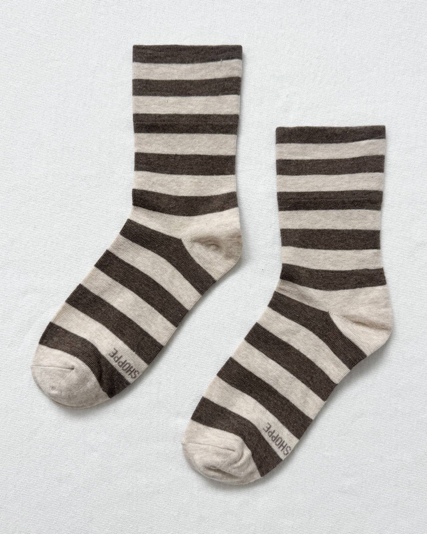 Pair of striped socks on a white background
