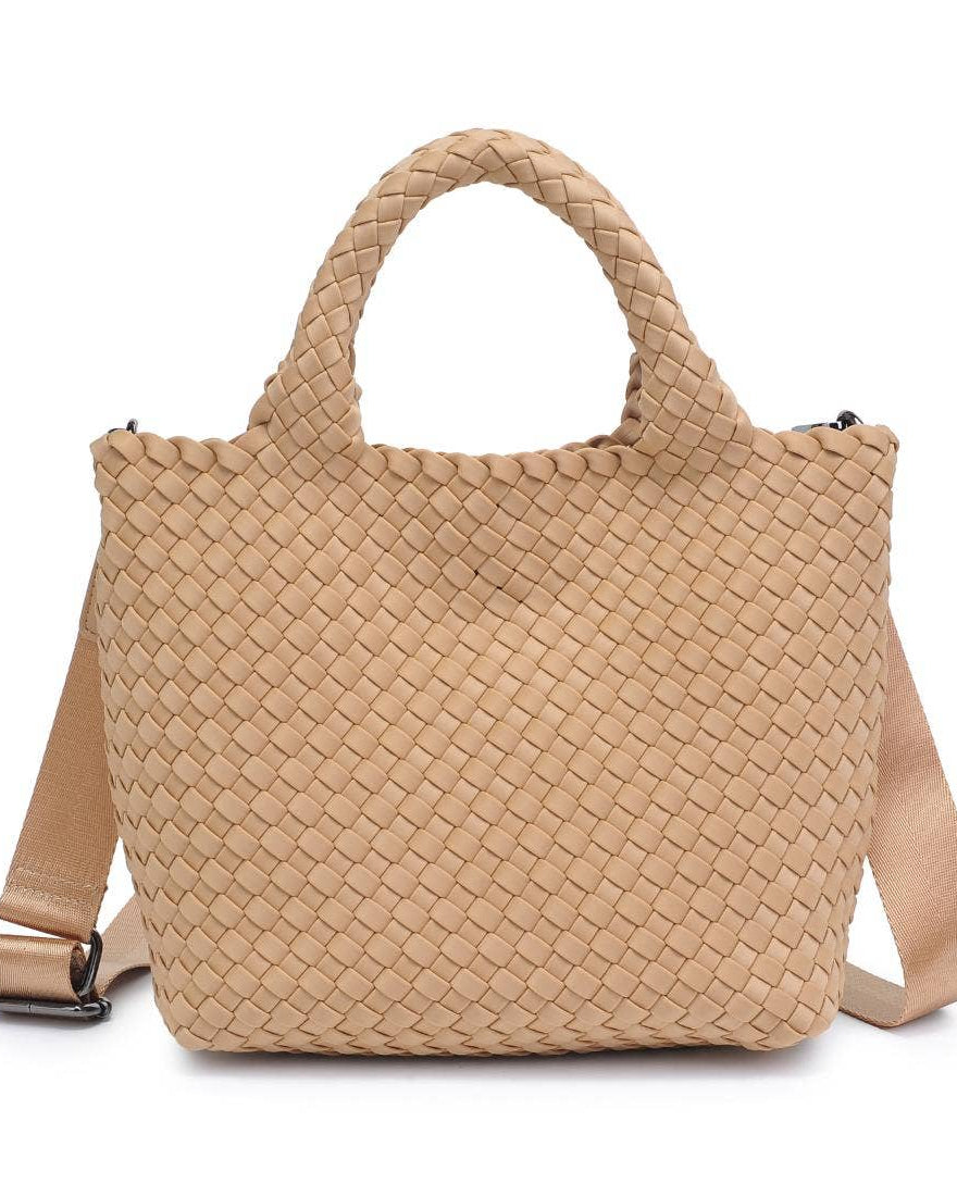 Beige woven handbag with a strap on a white background
