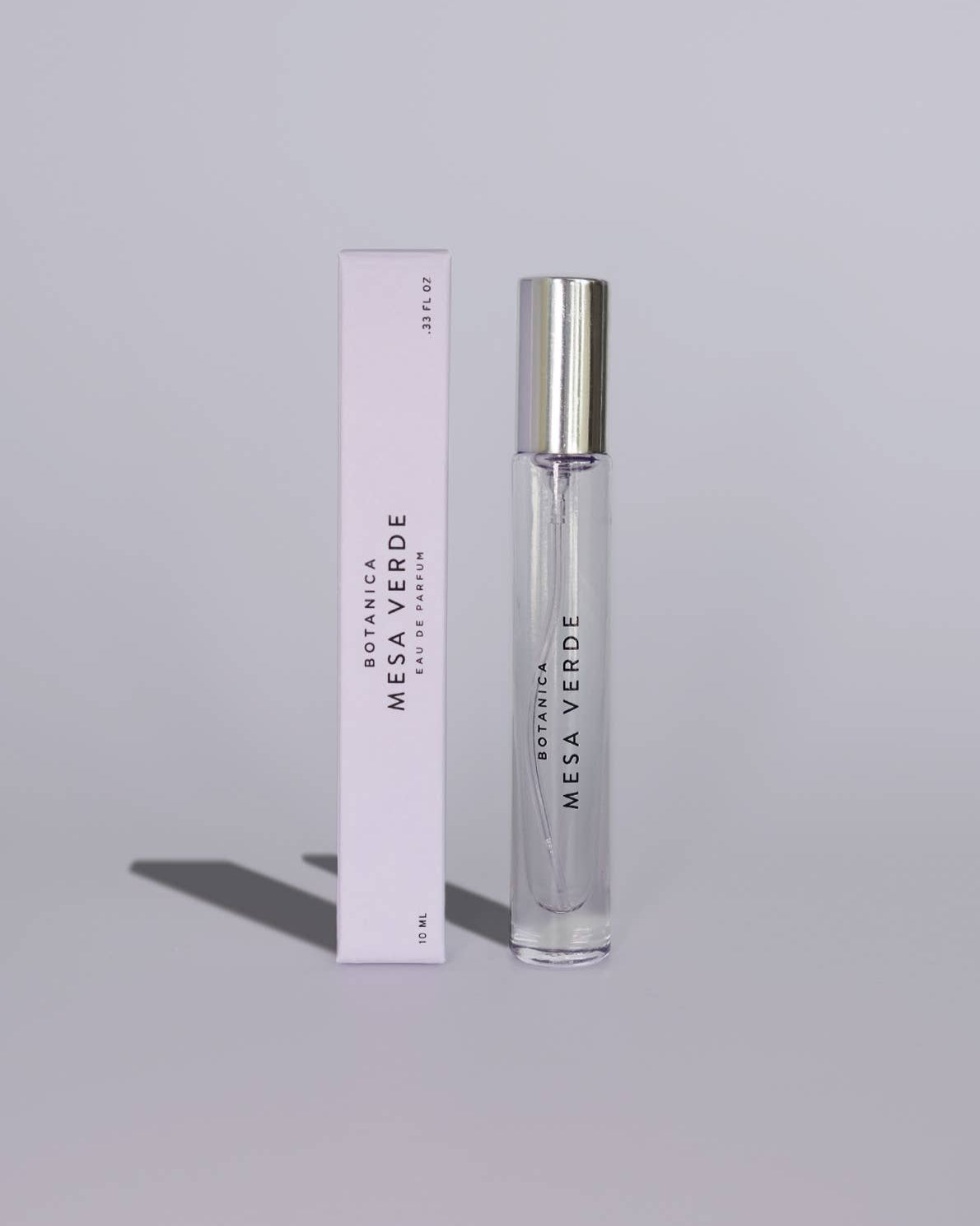 Mesa Verde perfume bottle and packaging on a gray background