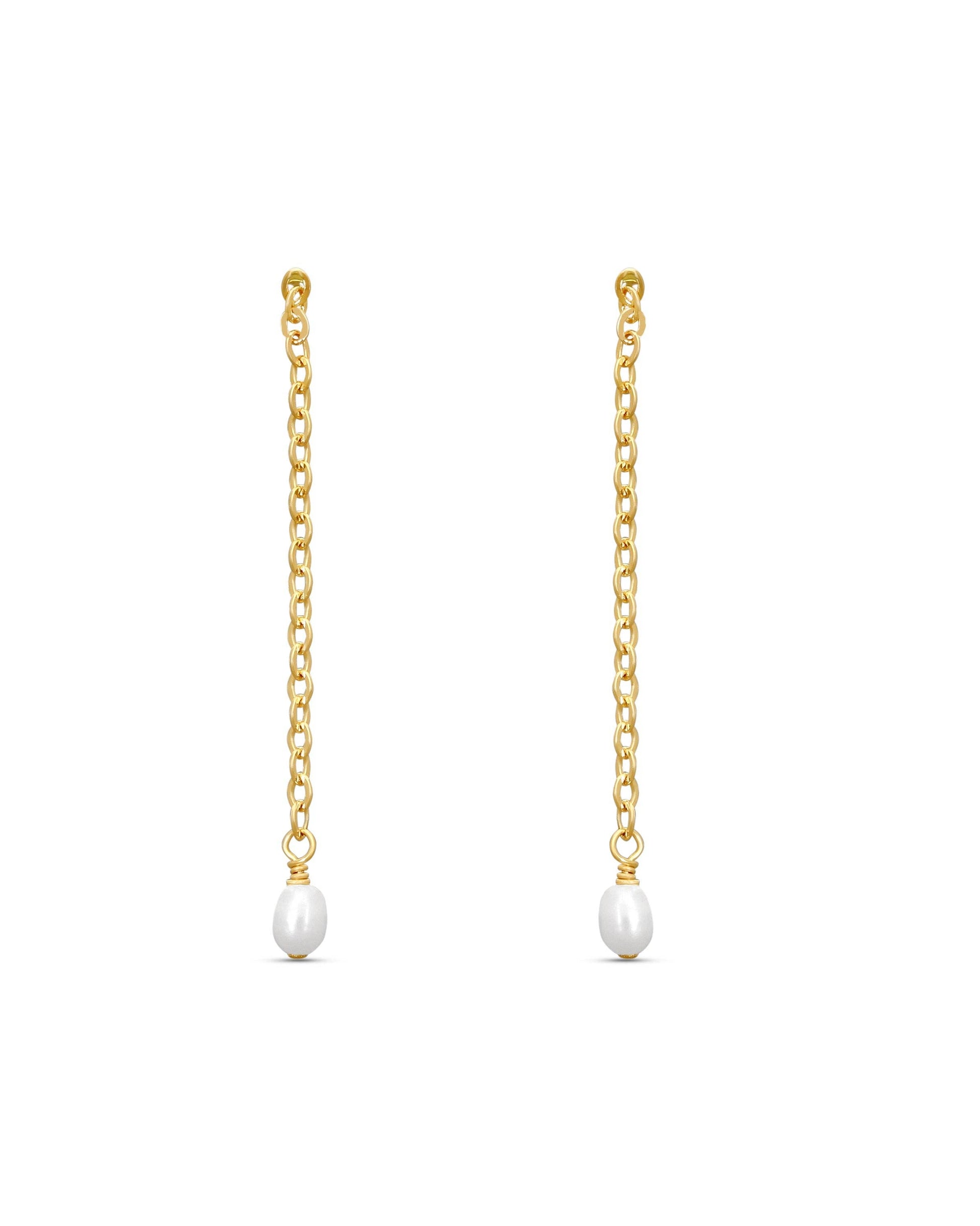 Gold chain earrings with pearl drops on a white background