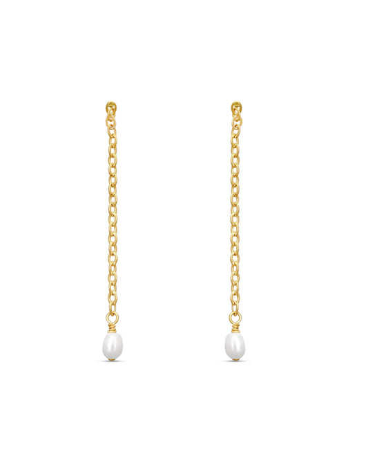 Gold chain earrings with pearl drops on a white background