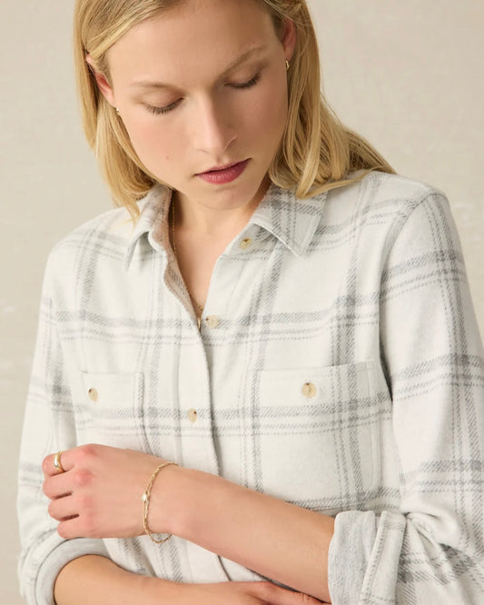 Model wearing Faherty Legend Sweater Shirt First Frost on a beige background 