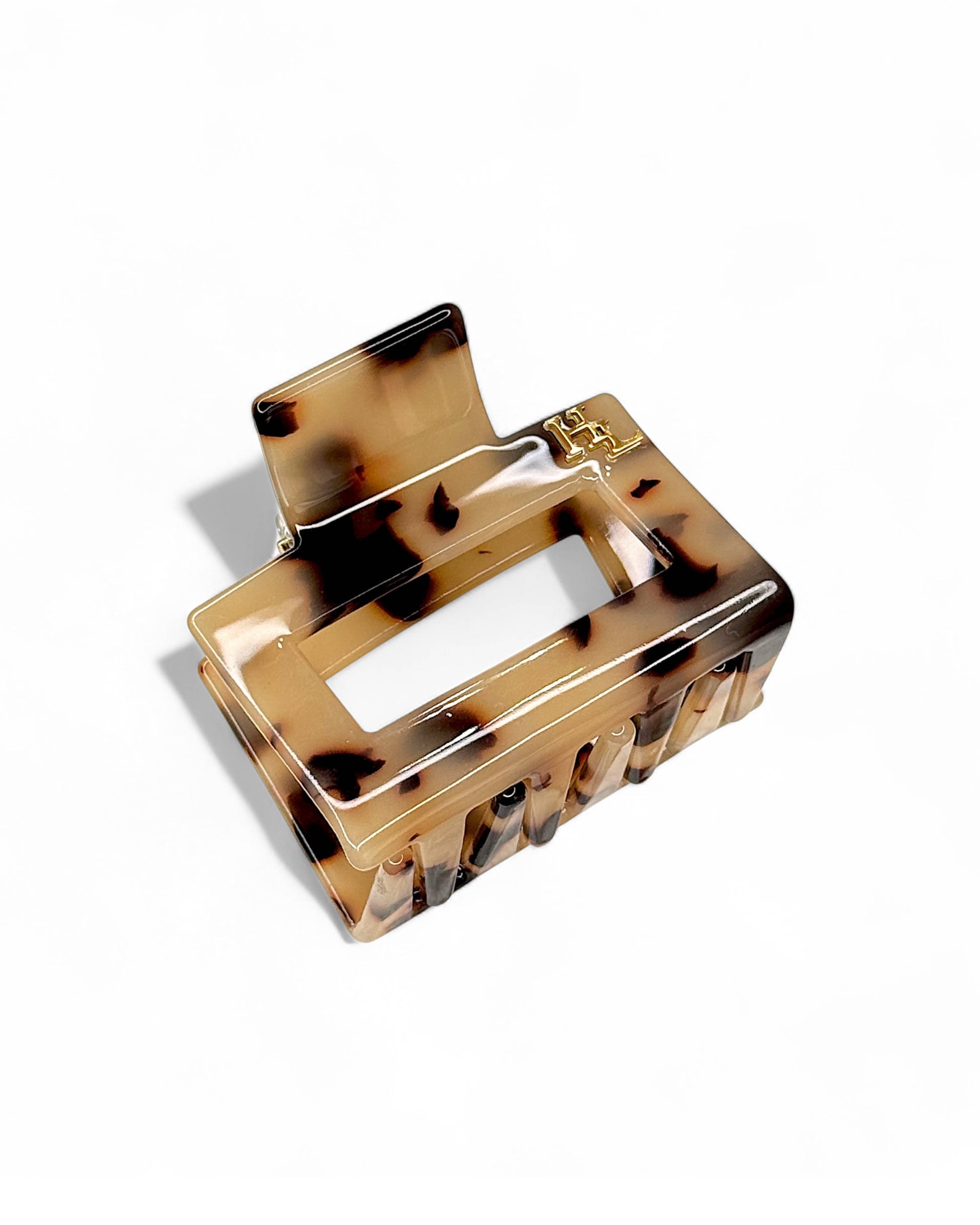 Tortoiseshell hair clip on a white background