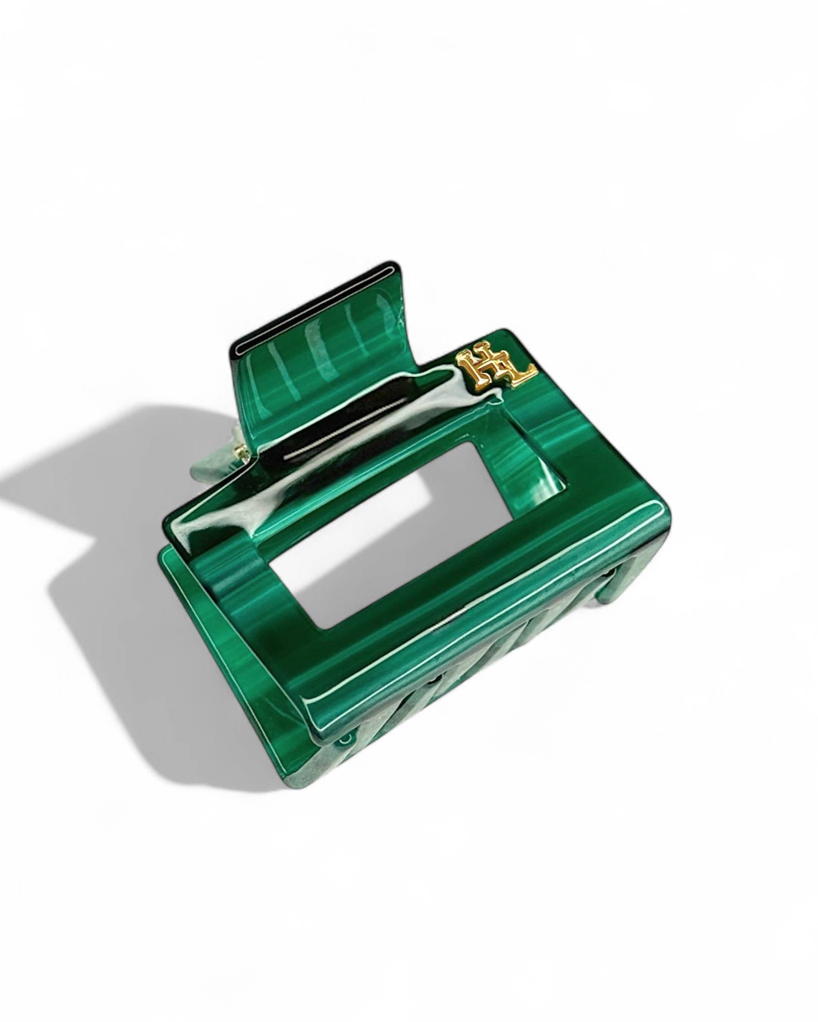 The HoneyLux Ecofriendly Acetate Midi Clip in Emerald on a white background