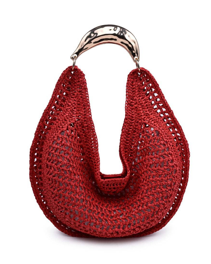 Red woven handbag with a gold handle on a white background