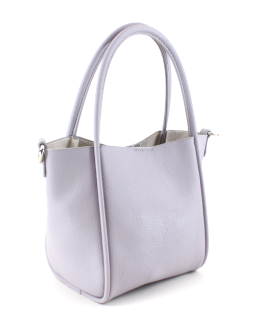 White handbag with a textured surface on a white background