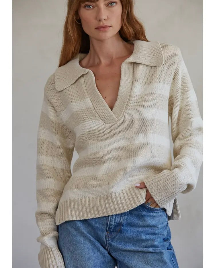 Model wearing By Together Chunky Polo Striped Sweater in white/sand wearing jeans on a white background